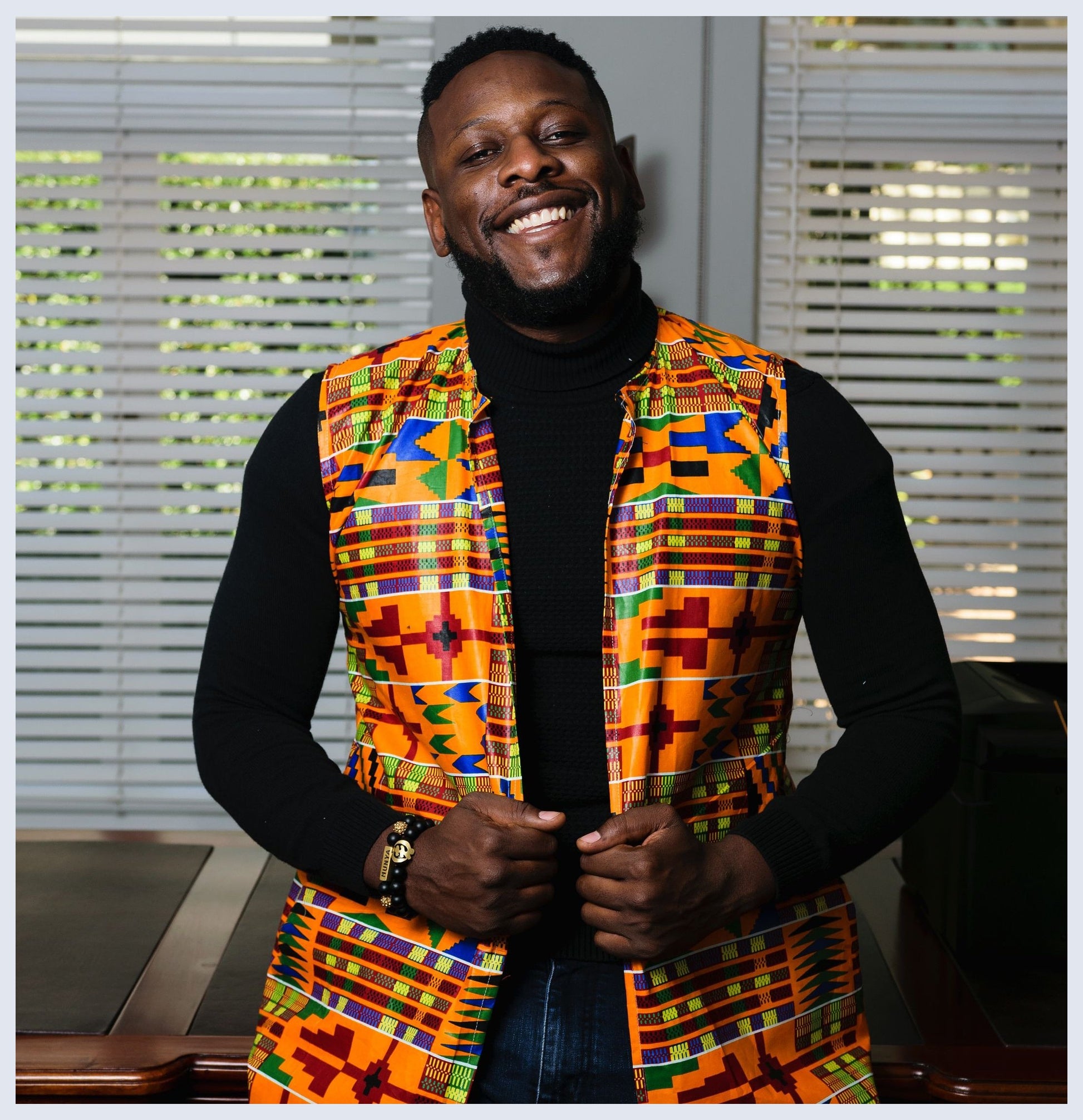 Kente Overcoat by Tribe Afrique. Tribe Afrique